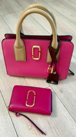 Vends sac à main élégant Marque COACH + porte monnaie assorti