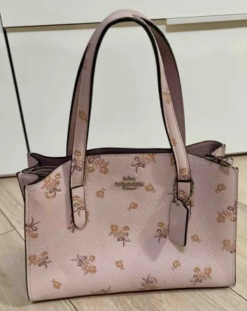 Vends sac à main COACH élégant