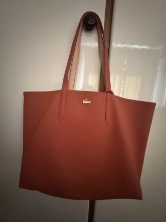 Sac Lacoste très peu servi